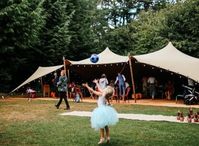 Party & reception stretch tent set up in a campsite in Ashbourne woods in Devon. 3 days of camping & celebrating a very special and unique wedding.