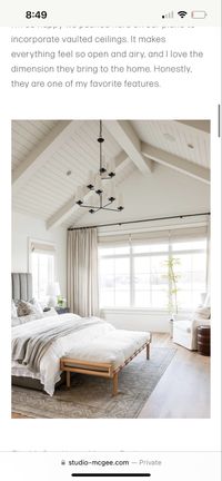 Shiplap ceiling and beams, brightnss of room, drapery, chandelier