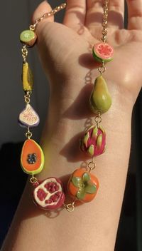 Polymer clay fruits necklace 18k gold plated stainless steel chain Fruits include: guava, pear, dragon fruit, persimmon, pomegranate, papaya, fig, plantain, and kiwi