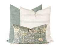 Create a feminine and cozy look for your living space with this 3-piece pillow set. Featuring a floral pillow cover with rich, detailed wildflower patterns, a woven fabric with neutral-colored stripes, and a soft velvety sage pillow, this set adds the perfect pop of color and personality to your home. The mix of floral, green tones and stripes make it perfect for enhancing your fall decor or adding a soft, earthy aesthetic to your home all year round. Ideal for sofas, beds, or accent chairs, these versatile pillows are perfect for layering and adding depth to any room. Pillow Combo 235 features (3) of our luxury pillow covers including: *  The Hamilton Pillow Cover - Features a soft beige woven fabric with subtle horizontal stripes in grey and tan colors. *  The Natasha Vertical Pillow Cov