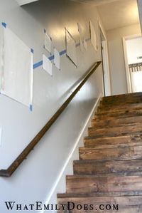 The stairs.... What a great way to space pictures going up a stairway! Thanks "What Emily Does.com"