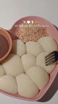 These are perfect for snacking! And it comes together in 10 minutes! Extremely EASY to make and Delicious!💗✨ Do try and Enjoy Bestie!🍡  Ingredients:✨ Glutinous Rice Flour- 45g Corn flour- 10g Sugar- 30g Milk- 90g Butter- 10g  1. In a bowl, Add Glutinous Rice Flour, Corn Flour, Sugar, and Milk. 2. Mix until combined. Filter and Transfer into a pan. 3. Add Butter. Mix and cook on low heat until a soft dough is formed. 4. (Use hand gloves to ease this step) Knead the mochi until stretchy. 5. Divide into bite-size pieces and coat with corn flour to prevent sticking. 6. Pair with chocolate sauce and Crushed Biscoff cookies. 7. Enjoy!✨