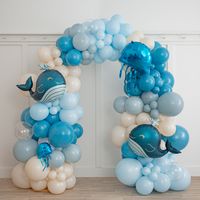 Ready to take your party to the next level? Our Ocean Bubbles balloon arch is sure to add the wow factor no matter your cause for celebration!  Our Ocean Bubbles balloon arch features a colour palette of pastel blue, retro deep blue, grey-blue and neutral sand, with clear bubbles, blue jellyfish and our super cute whale foil supershape balloons - sure to be the showstopper at your next celebrations!  Our super impressive Ocean Bubbles balloon arch is freestanding, so you can place it where you need it and measures 2m x 2m.  The arch is pre-made and arrives in 3 parts; 2 base plates and the arch that slots into these base plates to create the finished product.  There is a Video QR code on the arch when it arrives to show you the straightforward instructions to slot it together, or you can v