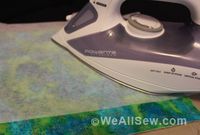 A quick tip on using press sheets to save both your iron and your sewing project! #SewingTip #pressing