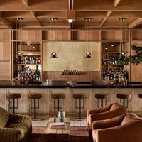 New York studio Post Company has designed warm, wood-filled interiors for a boutique hotel in Aspen, Colorado, which offers a pared-back take on the Arts and Crafts style.