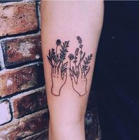 These hands with flower powers. | 31 Stunning Floral Tattoos To Get You Ready For Spring