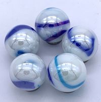 These gorgeous 16mm "Jellyfish2" player marbles come in packs of 5 and are made by Vacor for House of Marbles.  They are very similar to the Tiger Shark marbles made by Mega Marbles, but these are the current version, not retired.  Each marble measures approximately 16mm (5/8") in diameter and is made of opaque white glass with aqua blue and violet-blue swirls covering the surface.  They are then coated with a lovely. iridescent finish that makes them sparkle like the sun reflecting off the surface of the ocean.  The colors are very nice and all marbles seem to be a consistent size.  Perfect for use as replacement game marbles, party favors, decor or crafting projects.  See the links below to order stainless steel, ring style, washer type display stands or our lovely, beveled glass stands