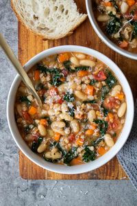 Made with whole grains, white beans, and vegetables, this one-pot Tuscan farro soup is a hearty and healthy soup perfect for a cold day.