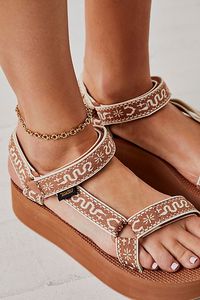 Take the classic Universal Teva and add a flatform to get this super cool and updated style. Comfortable and easy to wear with adjustable straps. * Hook and loop closures * Contoured footbed | Teva Flatform Universal Sandals at Free People in Tan, Size: US 7