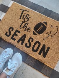 "'tis the season for football doormat  The doormats are 100% coir with a sturdy rubber backing. I handpaint and seal the mats for protection. The doormats are 18x30\". Each mat is unique. Fibers may be thicker or thinner or there may be small chunks of coconut husks in the fibers. Mats are best placed in a covered area away from the elements. I do not recommend placing your mat in areas with direct sunlight, rain, or snow as fading may occur. Returns will not be accepted due to wear or fading. M