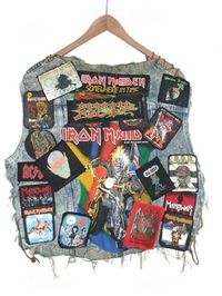 denim vest iron maiden I have a pair "concert" jeans from the 60s, 70s, and 80s that look like that. Embroidered patches from every band, and pins, ribbons, silver charms, all concert related and sewn to those jeans. A scrapbook of 20+ years of my life