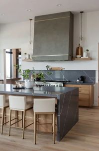 a styish kitchen with flat panel cabinets