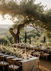 Tuscany wedding, Rustic elegance, Italian charm, Al Fresco dining, Tuscan tablescape, Vineyard wedding, Romantic setting, Farmhouse chic, Olive branch decor, Sun-kissed ambiance, Under the Tuscan sun, Mediterranean flair, Intimate celebration, Timeless beauty, Vintage charm, Tuscan-inspired feast, Olive grove romance, Tablescaping dreams, Elegance in simplicity, Rustic sophistication, Classic Italian wedding, Sunflower accents, Wine country charm, Family-style dining, Golden hour romance, Lavender-infused tables, Tuscan countryside vibes, Floral abundance, Old-world allure, Warm and inviting