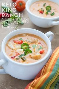 Titled image of Keto King Ranch chicken soup in a white bowl with a colourful striped napkin beside it