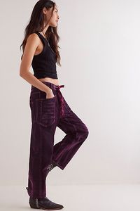 So cool and colorful, these jeans are the perfect unique pair. **Fit:** Mid-rise, tapered barrel silhouette **Features:** Pull-on design, oversized workwear pockets, corded drawstring waist, special velvet flocked fabrication over denim **Why We | We The Free Moxie Flocked Pull-On Barrel Jeans at Free People in Purple, Size: 25