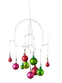 Got more ornaments than space on the tree? Here's a fun way to utilize those Christmas orbs. #christmas #holiday #crafts