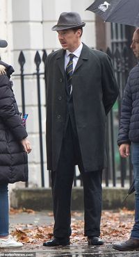 Benedict Cumberbatch looks dapper in dashing trilby hat as he transforms into 1960s spy on set