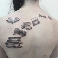 Tattoo uploaded by Fanny • #flyingbooks #flyingbookstattoo #bookflight #bookflighttattoo #books #bookstattoo #livres #livretattoo #envoldelivres #voldelivres #tattoo #tattoodo #tatouage #blackandgrey #blackandwhite #blackandgreytattoo #blackandwhitetattoo #backtattoo #welove #lespetitspointsdefanny #tattoolausanne • Tattoodo