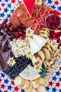 The Ultimate Red White and Blue 4th of July Cheese Board #4thofjuly #cheeseboard #charcuterie