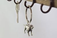 We designed this keyring at Mylee London so it is completely unique to us so you won't be able to buy them from anyone other than us. We can engrave any names or a message onto the keyring if you wish. Pewter is a mixture of silver and tin. What is so good about pewter is that is relatively cheap compared to silver but it isn't plated so it doesn't change colour like cheap plated metals.