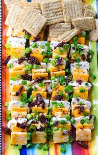 Spicy Marinated Cheese makes an easy party appetizer. #thanksgiving #food #recipes #thanksgivingrecipes #appetizers #thanskgivingappetizers