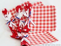 Smart idea: Punch hole in paper plate and tie ribbon around napkin & utensils. It's much easier for your guests to grab one thing instead of five!