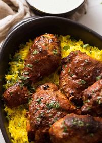 Tandoori Chicken on saffron rice, fresh out of the oven ready to be served