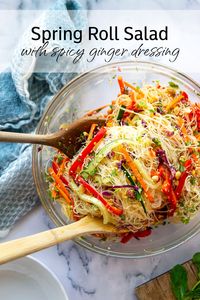 This loaded spring roll salad features a rainbow of fresh veggies and tender rice noodles tossed in a flavorful spicy ginger dressing. - it's so easy to make ahead of time for lunch or a side dish!