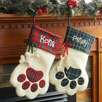 Add some jingle to the hearth with this personalized stocking.