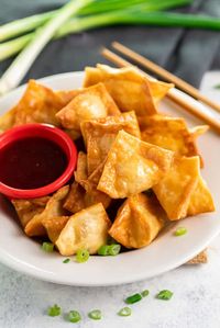 Crispy wontons are baked or fried to golden perfection and filled with an easy cream cheese Crab Rangoon filling. Plus, they're easy to make ahead of time for seamless entertaining!  | The Cozy Cook | #appetizers #crabrangoon