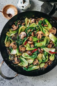 An easy bok choy mushroom stir fry that can be whipped together quickly for a speedy weekday dinner. The tender mushrooms and crisp bok choy are brought together with a gingery garlicky brown sauce, which tastes comforting and satisfying. Serve it as a side or a main course over steamed rice. {Vegan, Gluten-Free Adaptable}