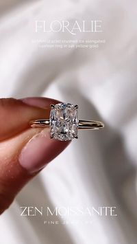 Floralie engagement ring has a solitaire design, 4 claw prongs, a flower basket and a 1.7mm plain gold band, set with a center 9x7mm (2.4cte) crushed ice elongated cushion moissanite gemstone.✨  Zen Moissanite jewelry pieces are custom made, ethical and durable Diamond alternatives.✨