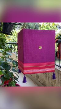 Difficulty: Medium     Diwali lantern   • Corrugated sheet - plastic  • Irkali cloth  • Pins  • Glue  • Cutter   • Threads