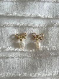 *These gold bow pearl earrings are handmade using enamel bow gold hypoallergenic earrings studs and pearls. *Cute and simple gold bow earrings that are handmade! Great for any occasion or as a cute addition to your everyday outfit. *I spend a lot of time and put lots of hard work into every single unique earring.