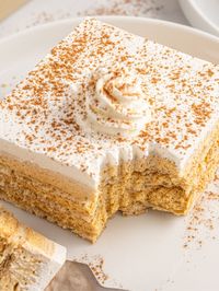 Pumpkin Icebox Cake is a no bake pumpkin dessert with fluffy & creamy layers of pumpkin cheesecake filling and graham crackers.