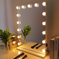 This sleek and stylish white Vanity Mirror with Lights is a must-have for anyone who wants to look their best. With built-in dimmable light bulbs and three light modes, this mirror allows you to adjus...