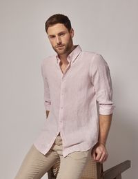 Made from luxuriously lightweight linen, this staple pink shirt is a versatile addition to your summer wardrobe It features a casual button-down collar, single cuffs and a relaxed slim fit Team with chinos and a linen blazer for an effortless summer look      • 100% Linen   • Slim Fit (Relaxed)   • Single Cuff   • Button Down Collar       The model is wearing a size Medium    Model is 6'1 / 186cm tall, with a 40 / 101 5cm chest and a 33 / 83 5cm waist