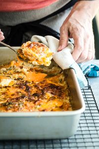 Creamy sweet potato dauphinoise loaded with garlic and rosemary.