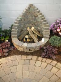 Check out this awesome firepit! I can finally put all those leftover cobblestones to use, now.