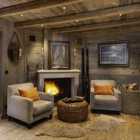 Talk stories of the day gone by and enjoy an aperitif by the fire... #interiordesign #interiorinspiration #luxuryinterior #luxurytravel #luxurychalet #courchevel