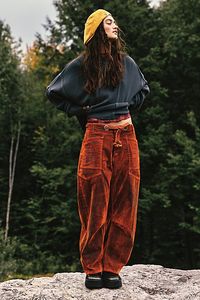 So cool and colorful, these jeans are the perfect unique pair.**Fit:** Mid-rise, tapered barrel silhouette **Features:** Pull-on design, oversized workwear pockets, corded drawstring waist, special velvet flocked fabrication over denim **Why We We The Free collection are sure to stun with every wear.