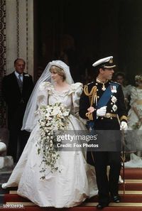 The wedding of Prince Charles and Lady Diana Spencer at St Paul's Cathedral in London, 29th July 1981. The couple leave the cathedral after the ceremony.