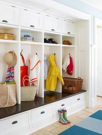 Keep your mudroom organized by giving each family member a separate section.