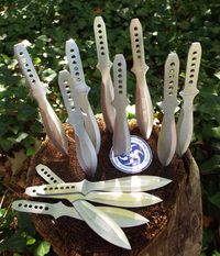 There can't be a cooler gift than this TWELVE piece knife set | 9" each, full tang with fierce sharp blade; they also come with a carrying pouch and several targets | Throwing Knives | Extremely-Sharp.com |