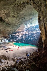 Camping adventure inside the world's third largest cave! Hike through the lush jungle in central Vietnam to reach this natural marvel, camp overnight and hike back out. This cave is so large it has it's own beach! Quang Binh Province, Vietnam.