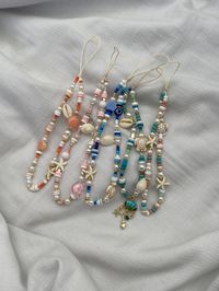 beaded phone charms made with waxed thread to ensure it won't break