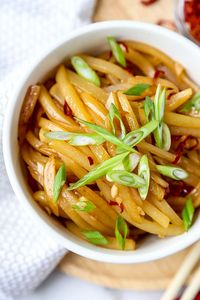 Chinese Shredded Potatoes with Vinegar and Chili -This authentic Chinese recipe of shredded potatoes with vinegar and chili is salty, sour, nutty and just spicy enough to make your lips tingle. Asian style potatoes for the win! #chinesefood #recipeoftheday #potato #veganrecipes #veganfood #plantbased | pickledplum.com