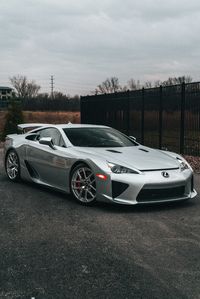 Lexus LFA 2011 Engine: 4.8L V10 Power: 419 kW / 570 hp Torque: 480 Nm / 354 lb-ft Weight: 1,480 kg / 3,262 lbs 0-100 kph: 3.7 seconds Top Speed: 325 kph / 202 mph