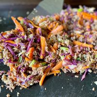 Egg Roll in a Bowl is a super easy and flavorful recipe to make on the flat top grill.  And it's healthy, too!  Loaded with veggies and your favorite ground meats, this low carb griddle recipe is easy to customize to your liking, and it cooks up super quick!