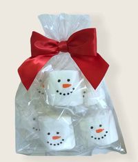 6 Jumbo (2") ImageMallow Snowman Face Marshmallows Individually wrapped and package is accented with a festive bow. Ingredients: Corn Syrup, Sugar, Dextrose, Modified Food Starch (Corn), Water, Gelatin, Natural And Artificial Flavor, Tetrasodium Pyrophosphate, Water, Propylene Glycol, Glycerine, FD&C red #40, red #3, blue #1, and yellow #6.  Choking warning: Children should be supervised while eating. Packaged in a facility with wheat and dairy